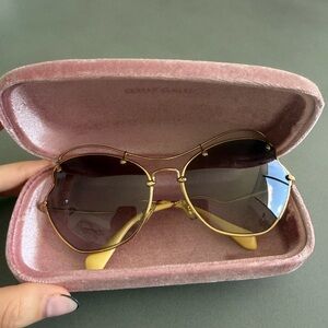 Miu Miu Gold Frame Sunglasses with Brown Gradient Lenses and Pink Case